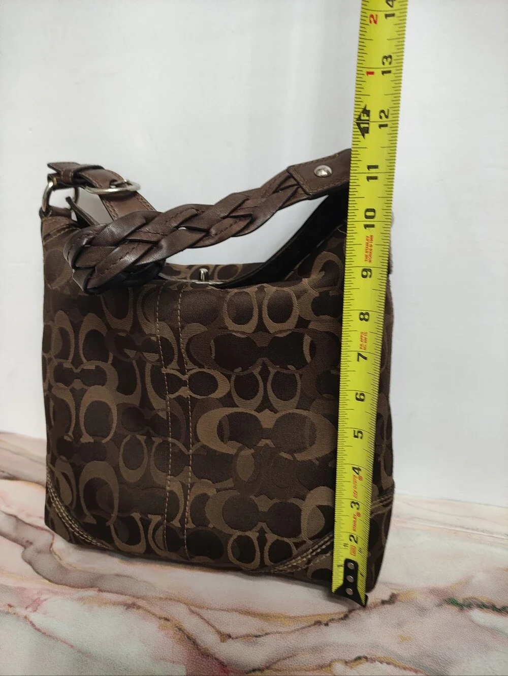 Coach signature fabric